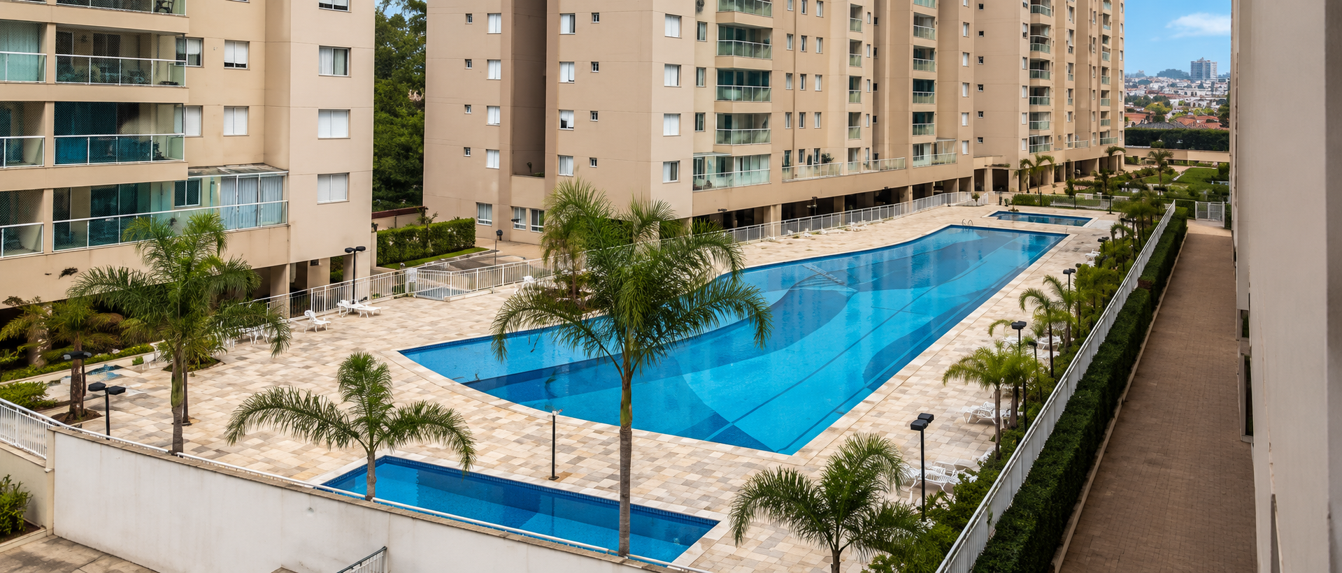 Piscina, deck e torres do Condomínio Alegria em Guarulhos, Vila Santo Antônio