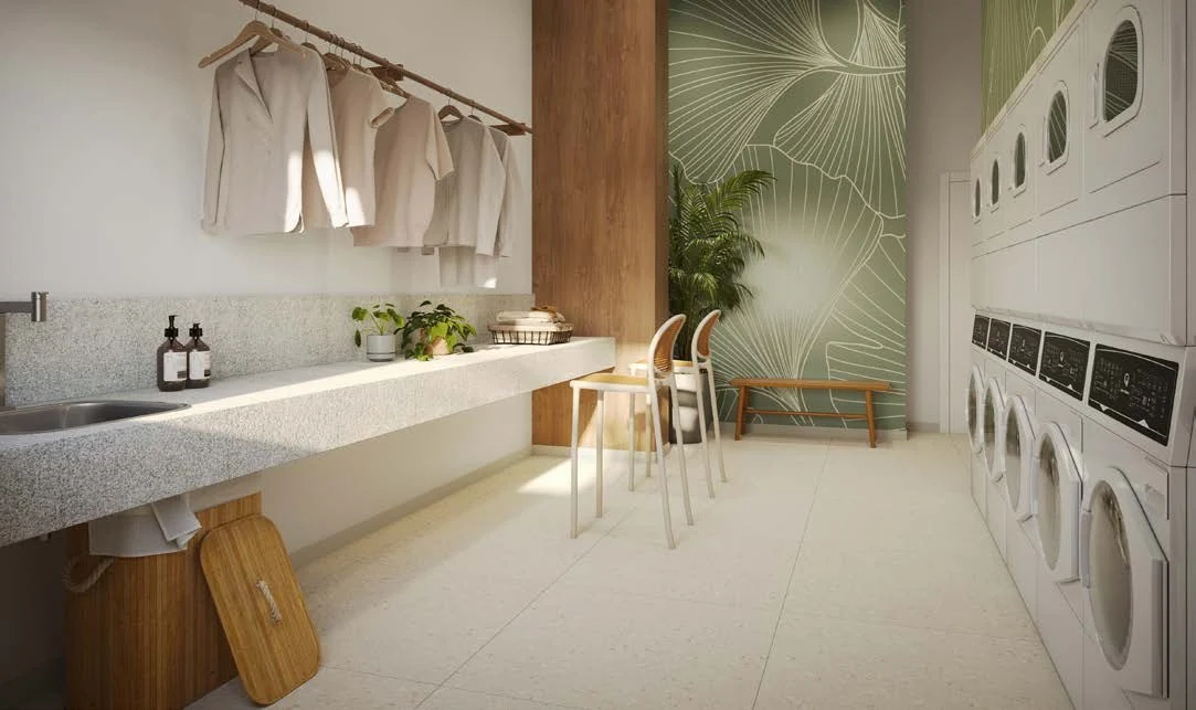 Lavanderia compartilhada do condomínio Residencial Marô by BP8 em Guarulhos